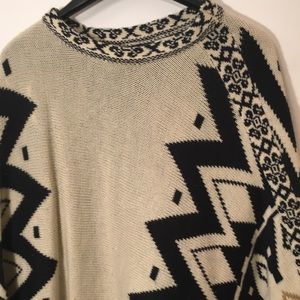 Listicle Aztec fringe knit poncho